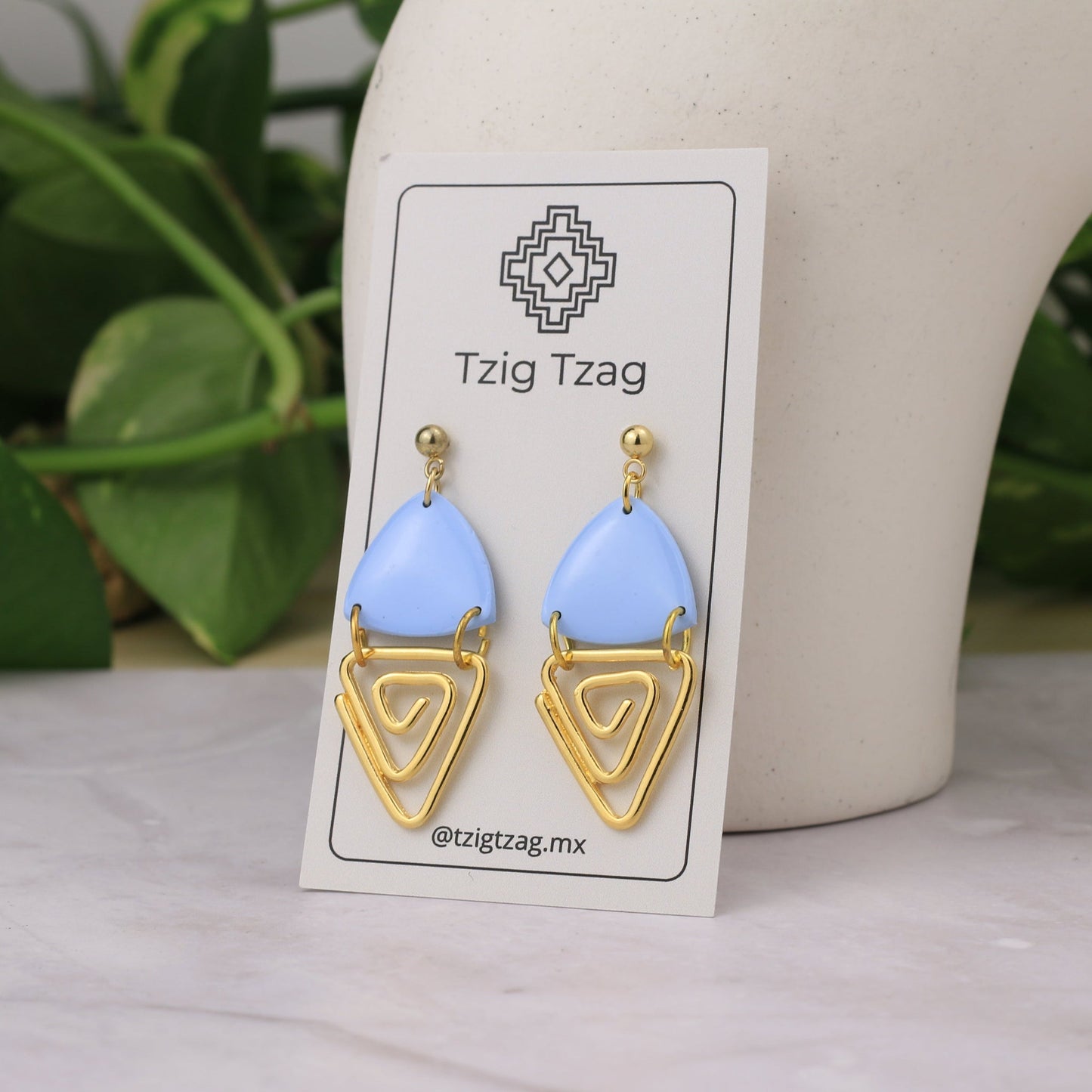 Aretes Jano Dorados - Tzig Tzag Joyería -Color Azul Cielo